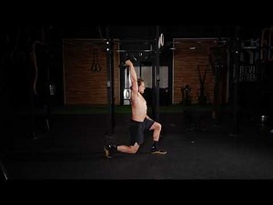 Single Arm Dumbbell Overhead Walking Lunge