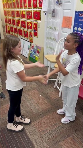 Scarlett and her friends doing this lemonade handshake! #lemonade #handshake #handclap #friends