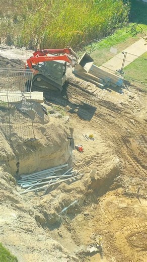 Here are facts about compact track loader Instead of wheels, it runs on rubber tracks, so it works well on mud or soft ground. The front part is a bucket that can scoop soil, sand, or stones. It can turn around in one spot, which is good for small spaces. The driver sits inside a safe cabin with protection. It works with hydraulic power to move the bucket and arms. Even though it looks small, it can lift heavy loads (over 1,000 kg in many models). The bucket can be changed with other tools like