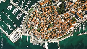 Biograd na Moru, aerial above marina view with ships and yachts at pier in row. Old European architecture in summer port, travel destination on Adriatic Sea coast, Dalmatia region of Croatia