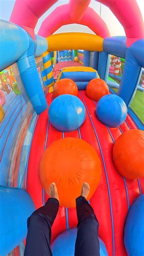 Don’t Fall Off! Extreme Bouncing Ball Challenge in Giant Inflatable