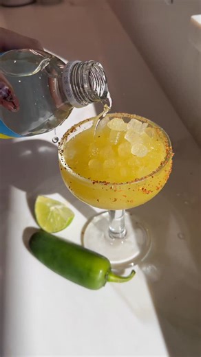Callie on Instagram: "Thank you, next. Spicy margarita mocktail from my book MOCKTAIL HOUR 1/4 cup orange juice juice of 1 lime 2 teaspoons of hot honey 1 jalapeño sliced ice 1 cup club soda ✨Rim your glass with lime wedge and roll in tajin, set aside ✨Add orange juice, jalapeños, lime juice and honey to your shake. Muddle ✨Add ice then shake til outside is frosty ✨Strain over your ice in your glass and top with club soda"