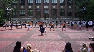 1.6K views · 3.2K reactions | As promised, here is a video of "Temptation" from the Michigan Drumline's performance on the Diag yesterday. While you're watching the video, pay special attention to the snares at 1:26 to see the first stick toss of the 2014 season! Our #CountdownToCadence is getting smaller and smaller! | The University of Michigan Marching Band | Facebook