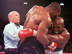 Let's get it on Mills Lane shunned a career in banking to keep Mike Tyson in line for biting Evander Holyfield’s ear in a colourful life as a marine, judge, boxing referee and star of Celebrity Deathmatch with ‘let’s get it on’ catchphrase