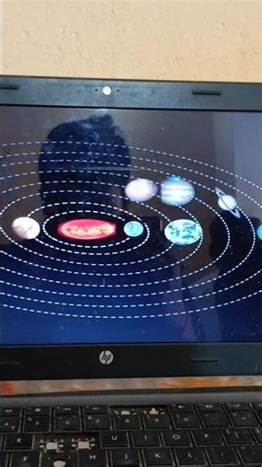 HP Laptop Screen Displaying Planetary Orbit Animation