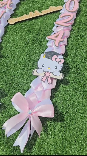 Hello Kitty graduation Lei. #maricelascreations #hellokitty #hellokittygraduation #graduationlei #classof2024 #collardegraduacion #pink #hellokittygrad #grad #graduationgift