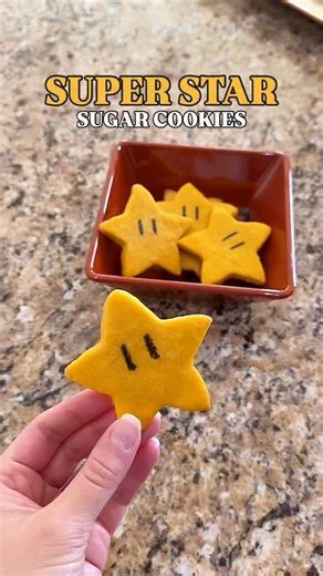 Keek ✨ on Instagram: "Super Star Sugar Cookies ⭐️🍄 🧑🏻‍🍳 You’ll need: - 1 Stick of butter, softened - 1/2 cup sugar - 1 egg - 1 1/2 cups flour - Yellow food colouring - Edible Black Pen (or black writing icing) - Star Shape cookie cutter 🌟(You can also use Betty Crocker’s Sugar Cookie Mix instead for easier use) ⏲️ Preheat oven to 350°F (175°C) In a bowl, cream the butter and sugar together Mix in the egg until smooth Add the flour and stir until a dough forms Slowly add a small amount of ye