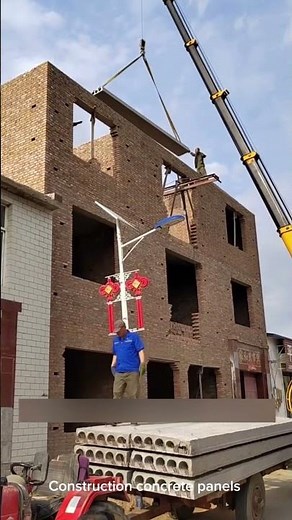 Lifting precast concrete panels installing roof building with crane technology