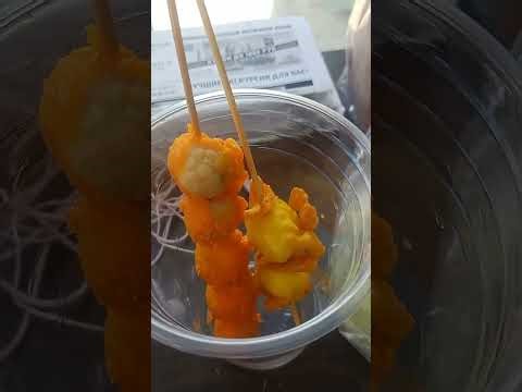 Thailand. A container hostel, unusual food, and street music.