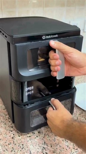 2.1K views · 13 reactions |  Cook two dishes at once - mains and sides in perfect sync  See-through window lets you watch the crisp happen ⚡ Sync Finish tech ensures both trays finish together  EcoFlow Air Heat gives even results, top to bottom  Oil-light cooking for healthy everyday meals 易 10 smart presets for pizza, fries, bake, roast & more 什 Easy-clean baskets, compact stacked design ✅ Free Shipping + 15 Day Free Trial | Nutricook | Facebook