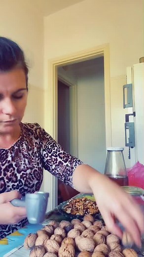 Preparing Walnuts with Oil in a Home Kitchen
