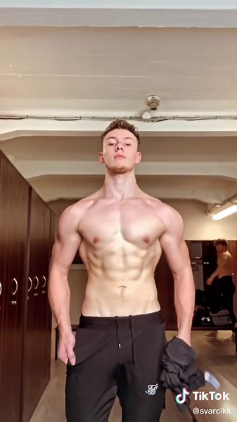 Shirtless Man Dives Into Lake for Fitness Progress Update