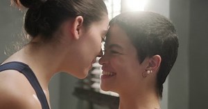 A lesbian couple having an erotic romantic moment closeup. Concept of same sex relationships, lgbt, lesbian lifestyle.