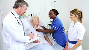clip-4761443-african-american-nurse-using-stethoscope-check-vital