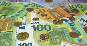 Real euro banknotes and metal coins of various colors, size and nominals. Banknotes 500, 200, 100 and 50 Euro and Euro cents of various denominations