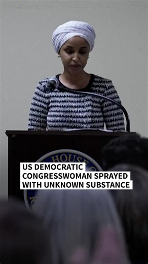 US Democratic congresswoman Ilhan Omar was targeted during a speech by a man who sprayed an unidentified liquid at her from a syringe, before being tackled by security guards. The man was led out of the premises as Omar — a frequent target of attacks by President Donald Trump — continued her speech, saying "we will stay resilient in the face of whatever they might throw on us." 🎥 Cecilia Sanchez | AFP News Agency
