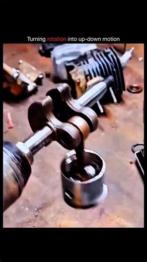 nedplu on Instagram: "This simple setup shows the basic working principle of an engine piston. When the crankshaft rotates, it pushes the connecting rod in a circular path. That circular motion is converted into up-and-down movement of the piston. This same mechanism is used inside car, bike, and generator engines, where fuel combustion pushes the piston and keeps the crankshaft spinning. Here, a drill replaces the engine power just to clearly demonstrate the motion. A small demo but it explains