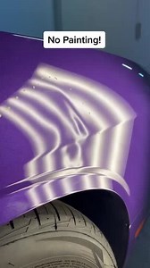 Person Does DIY Paintless Repair on Car Dent