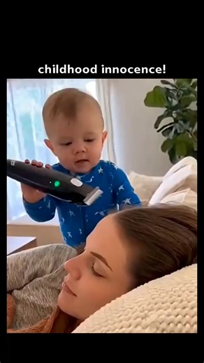 Zeeldom on Instagram: "You won’t believe what happened in this viral clip! 😱 A little kid got curious and grabbed a hair-cutting machine while his mom was peacefully relaxing on the sofa. What was supposed to be a calm moment quickly turned into chaos as the trimmer went straight for mom’s golden hair! ✂️💇‍♀️ The look on her face says it all—shock, disbelief, and a little bit of “how could this happen?!” 😂 Meanwhile, the kid seemed proud of his “hair-cutting skills,” completely unaware of the