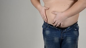 Man and big belly. Overweight Man.