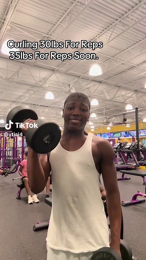 13-Year-Old Fitness Enthusiast Curling 30 Pounds