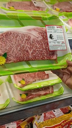 I'm buying US $100 per lb Japanese Wagyu beef at the Japanese super market in Hawaii 🤑 Japanese Wagyu is a premium beef known for its exceptional marbling, tenderness, and rich flavor, originating from four specific breeds of cattle raised in Japan. Wagyu (和牛), meaning “Japanese cow,” refers to four main breeds: Japanese Black, Japanese Brown, Japanese Shorthorn, and Japanese Polled. Among these, Japanese Black accounts for about 97% of Wagyu raised in Japan, and it's especially prized for its 
