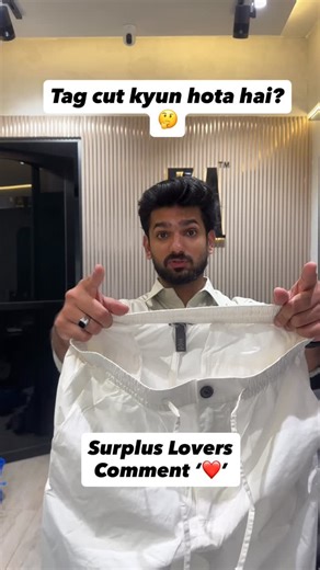 Zain Aesthetics | Clothing Store on Instagram: "“Why is the brand tag behind the collar cut?” 🤔 This is one of the most common questions people ask when they see surplus clothing. These are export surplus / factory surplus pieces. When international brands produce extra stock, cancelled orders, or size-mismatch units, the garments are released under strict rules. One of those rules is removal of the brand identity — which is why the main collar label is cut. The fabric, stitching, fit, and fini