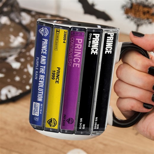 7K views · 6.2K reactions | Party like it's 1999... every morning! Our Prince retro cassette two-tone mug brings His Royal Badness to your coffee routine. Get yours today! Check out our collection for your favourite artists: https://mtervodesign.com/collections/retro-music-cassette-collection | MTervoDesign | Facebook
