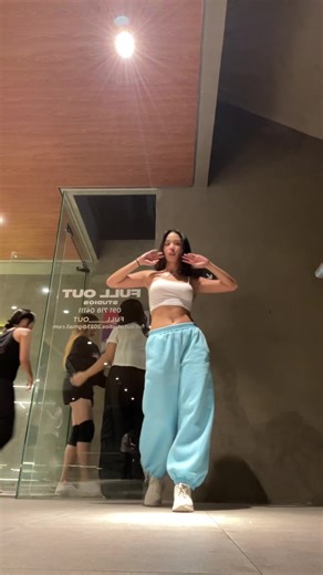 Dance Routine in Stylish Indoor Setting