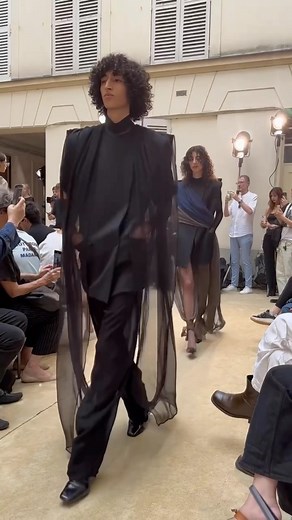 13K views · 79 reactions | When Burç Akyol initially applied for a spot on the Paris Fashion Week women’s schedule last year, he was turned down. It turned out to be a blessing in disguise–instead, he made his debut this season fresh off reaching the finals of the LVMH Prize. Speaking with WWD backstage following his show today, Akyol shared his thoughts on the sheer trend for men. Read more at the link in bio. Video and report: @jdiderich | WWD | Facebook