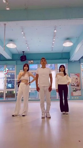 Synchronized Dance Routine in Stylish Modern Space