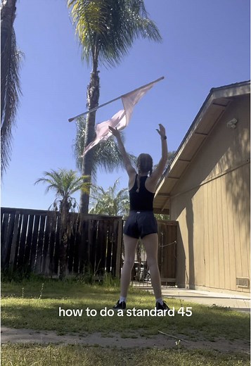 How to Perform a Standard 45 Toss in Color Guard