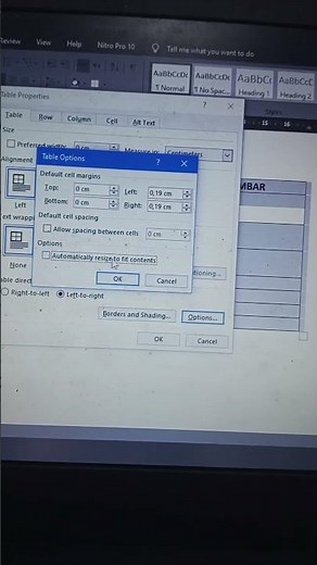 Cara mengatur tata letak foto/gambar dalam tabel di word.