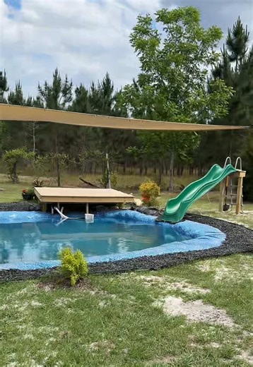 Just waiting on the kids now to see how they like it. Slide was the easiest part to figure out so far for sure on the whole pond process. #swimpond #waterslide #diy #fyp