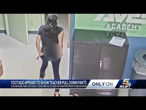 Footage appears to show Sycamore teacher pull pants down during board meeting