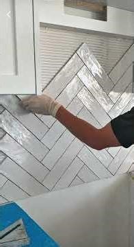 Hairingbone splashback tiling