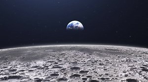 Cinematic planet earth view from the moon surface. Starry space in the background. Travel across the lunar soil with craters.