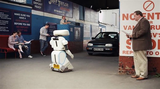 BRIAN the Robot explains Confused.com QuickQuote at a car auction