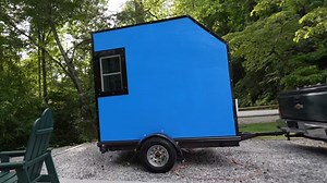 We built a 'tiny home' on wheels for under $900 - it has everything you need