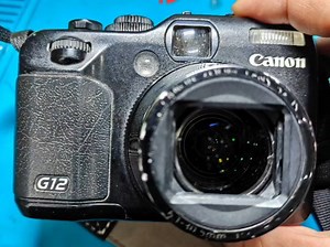 佳能G12镜头错误 不开机，花屏，油画，黑屏快速维修