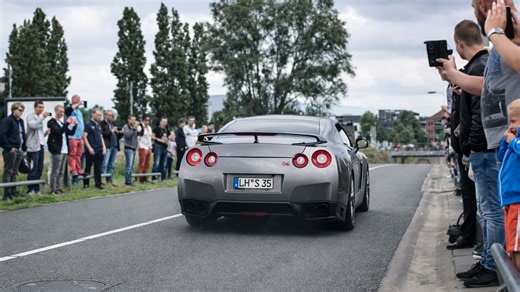 Nissan GT-R launches hard with loud exhaust echo past crowd