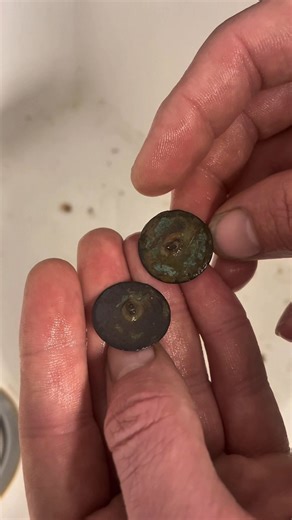 616K views · 12K reactions | Luke and I got permission to metal detect around the fields of this plantation house built around 1845. We were able to locate several cool relics, including two military buttons off of the same jacket. At first I didn’t know what these buttons exactly were due to a thick layer of crust, but we were able to bring them back to life using our special cleaning method! #metaldetecting | Pondering the Past | Facebook