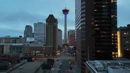 Aerial view of Calgary's skyline on a winter evening at sunset.