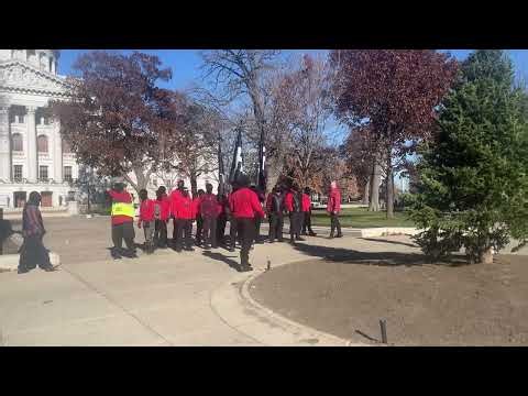 Neo-Nazi demonstrators march in downtown Madison