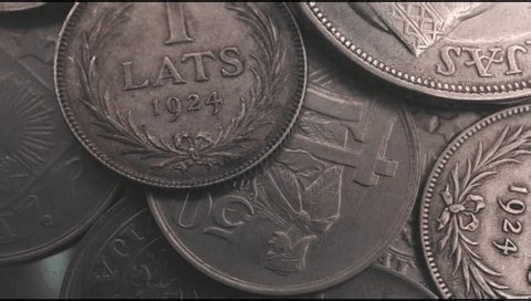 clip-3998132675-macro-shot-historic-latvian-lats-coins-stack