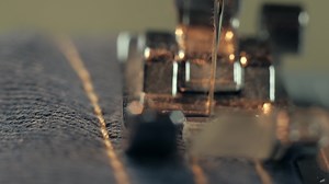 Download Macro 4k Of A Sewing Machine Working for free