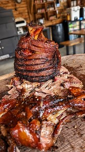 Can you have crackling and pulled pork together? Absolutely! Pork hocks are a ridiculously cheap cut. I've slapped a couple of them on to my favourite @kamadojoeuk accessory, the Joetisserie and spun them over fire with a bit of cherry smoke until they hit 93c internal temperature. I started at 240c then slowly dropped this throughout the cook. This ensures the fat starts to render from the start which helps give us that beautiful crispy skin. And taking them to 93c ensures that any connective t