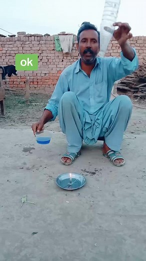 Traditional Practice of Pouring and Lighting Blue Liquid