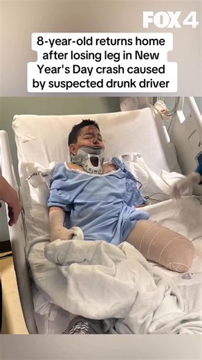 An 8-year-old boy returned home Friday to begin rehabilitation after losing his leg in a New Year’s Day crash caused by a suspected drunk driver on Central Expressway. The community has raised over $114,000 to help the family cover medical costs, a prosthetic leg, and a move to a one-story home to accommodate the child’s mobility needs. The suspect, 23-year-old Michael Lavarius McRae, is currently out on bond and faces multiple charges, including intoxication assault causing serious bodily injur