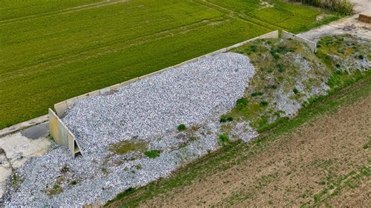 Huge piles of plastic waste discarded on disused WW2 airfield
